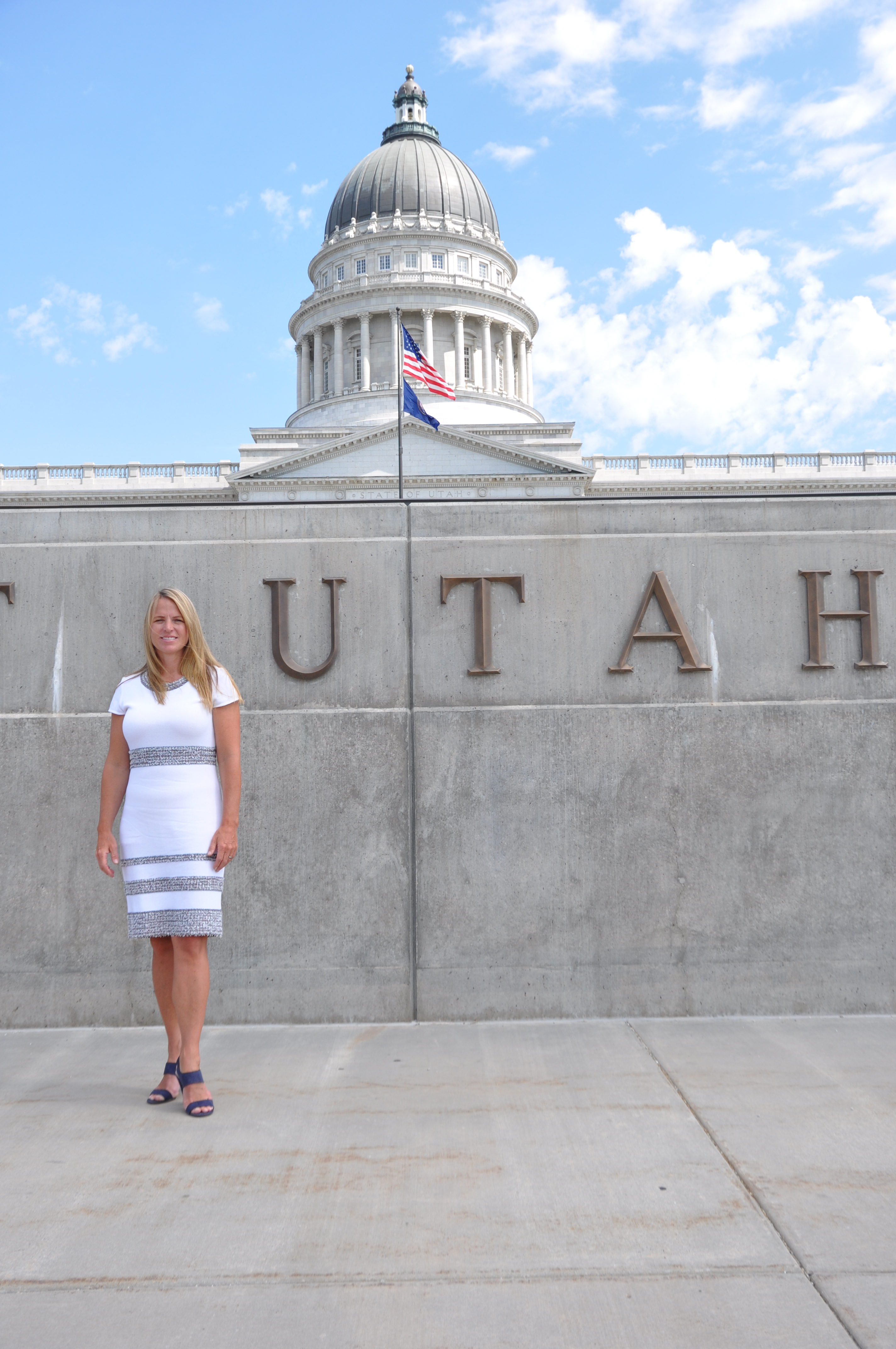 Michele Weeks standing in front of the Utah State Capitol
